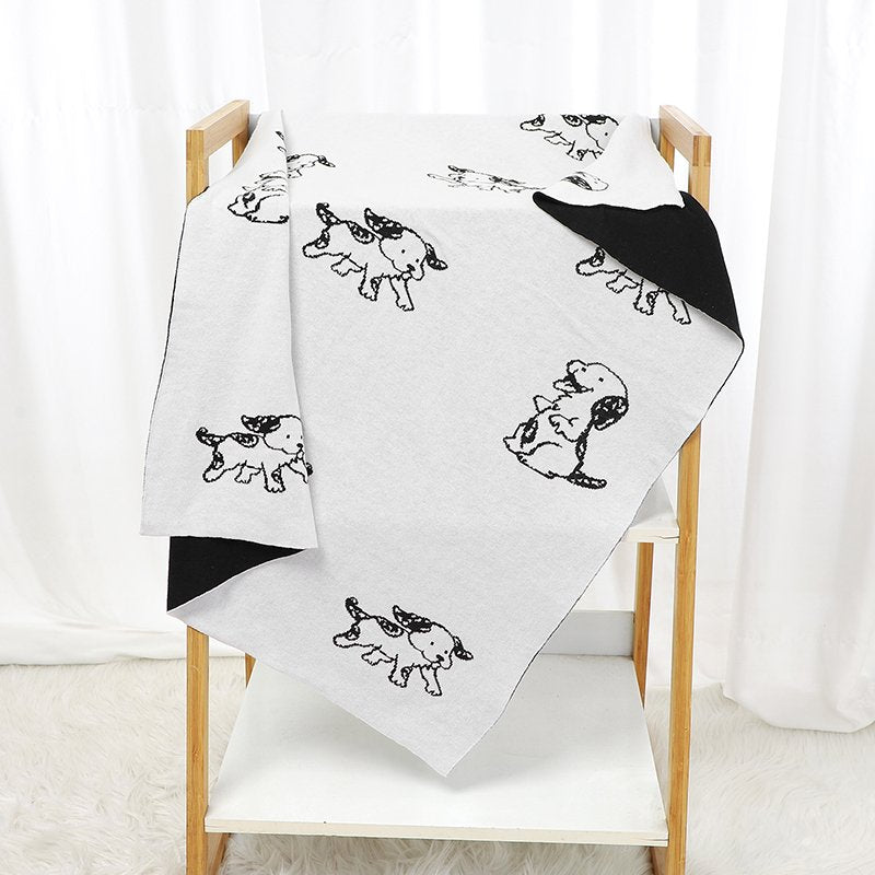 Gestrickte Babydecke aus Baumwolle mit Hundemotiv