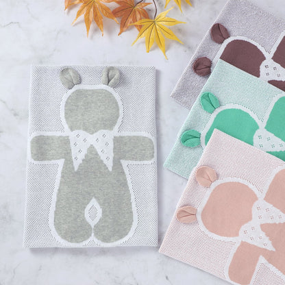 Weiche Strickdecke mit Hasenmotiv