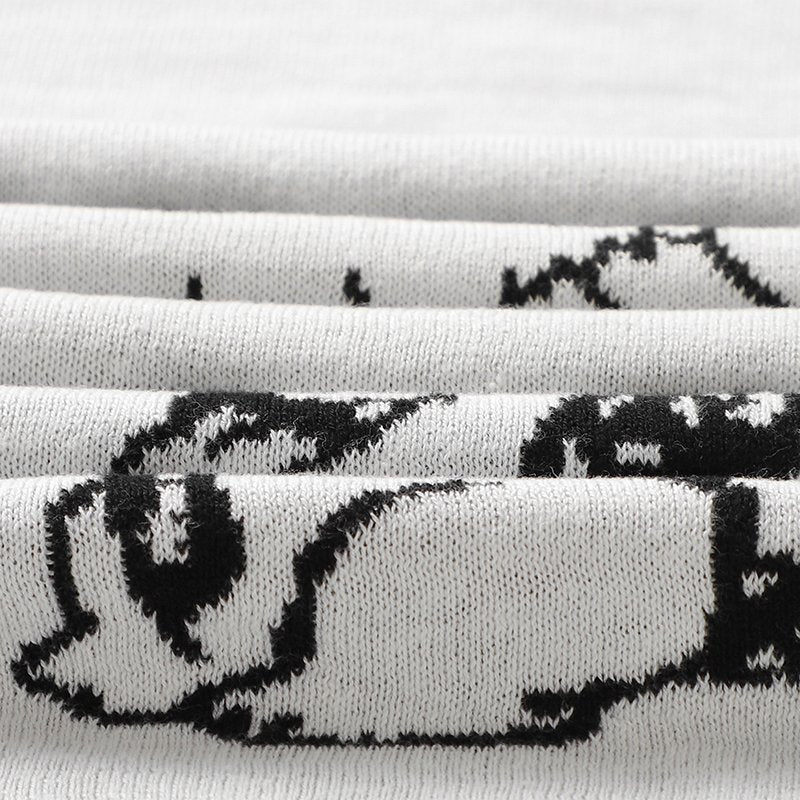 Gestrickte Babydecke aus Baumwolle mit Hundemotiv