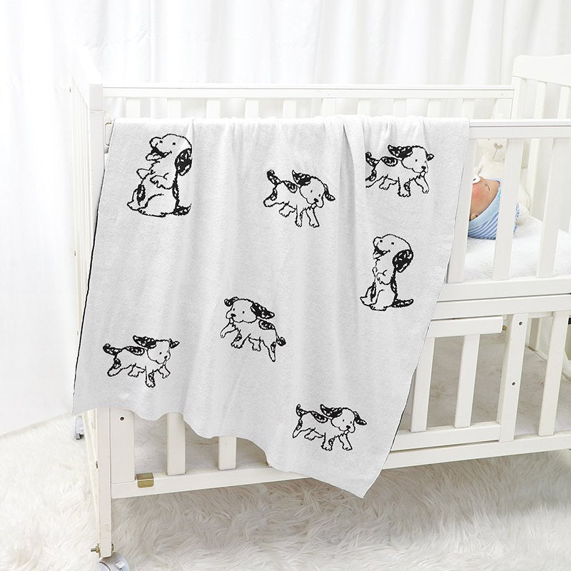 Gestrickte Babydecke aus Baumwolle mit Hundemotiv