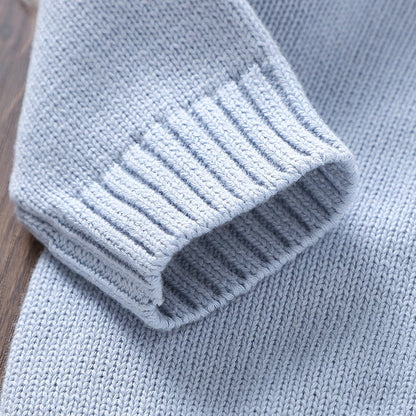 Gestrickter Baby-Strampler mit Fuchs