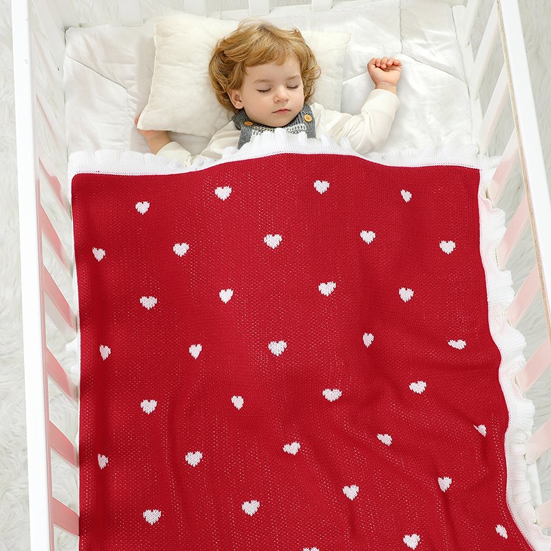 Gestrickte Weihnachtsdecke – Herzmuster