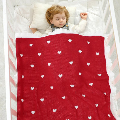 Gestrickte Weihnachtsdecke – Herzmuster