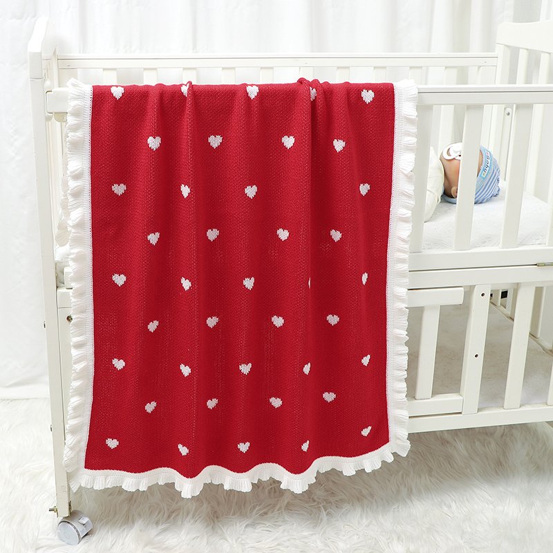 Gestrickte Weihnachtsdecke – Herzmuster