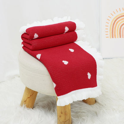 Gestrickte Weihnachtsdecke – Herzmuster