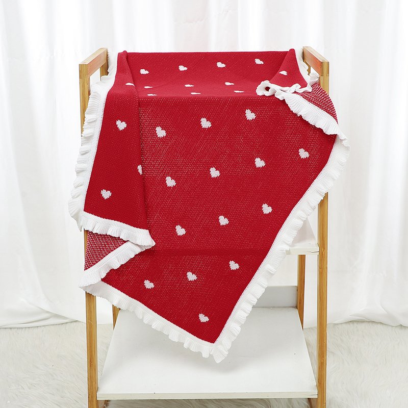 Gestrickte Weihnachtsdecke – Herzmuster